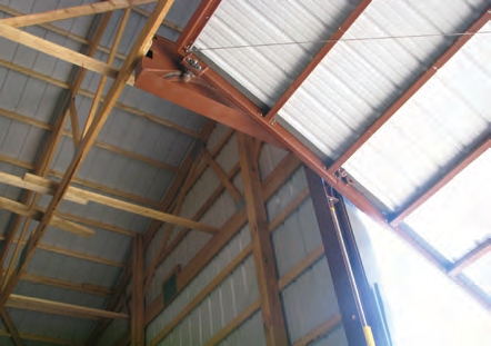 Don’t forget to leave enough room for the overhead doors to slide into the building and have enough clearance for the tanks.