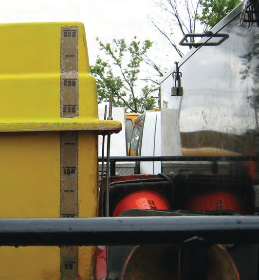 A translucent area with graduated markings allow you to estimate a tank’s contents.
