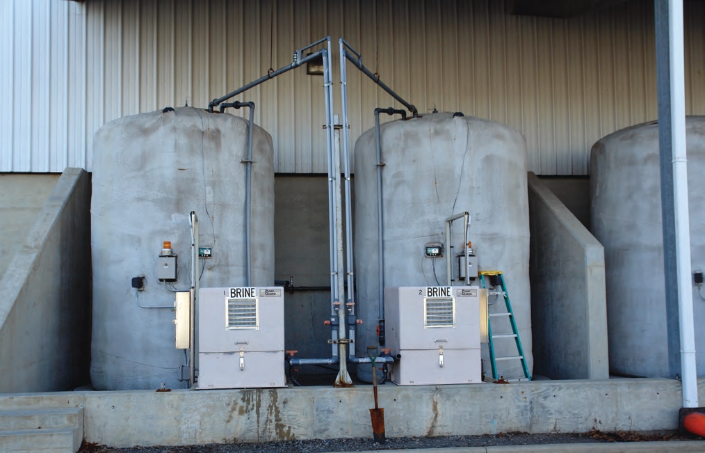 These brine tanks have been coated with insulation to protect their contents from cold weather.