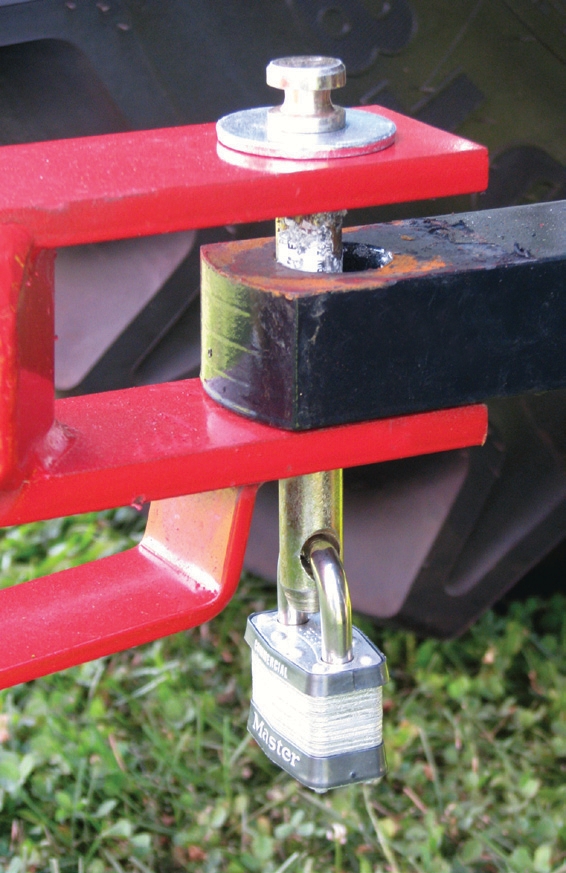 Attaching locks to hitch pins