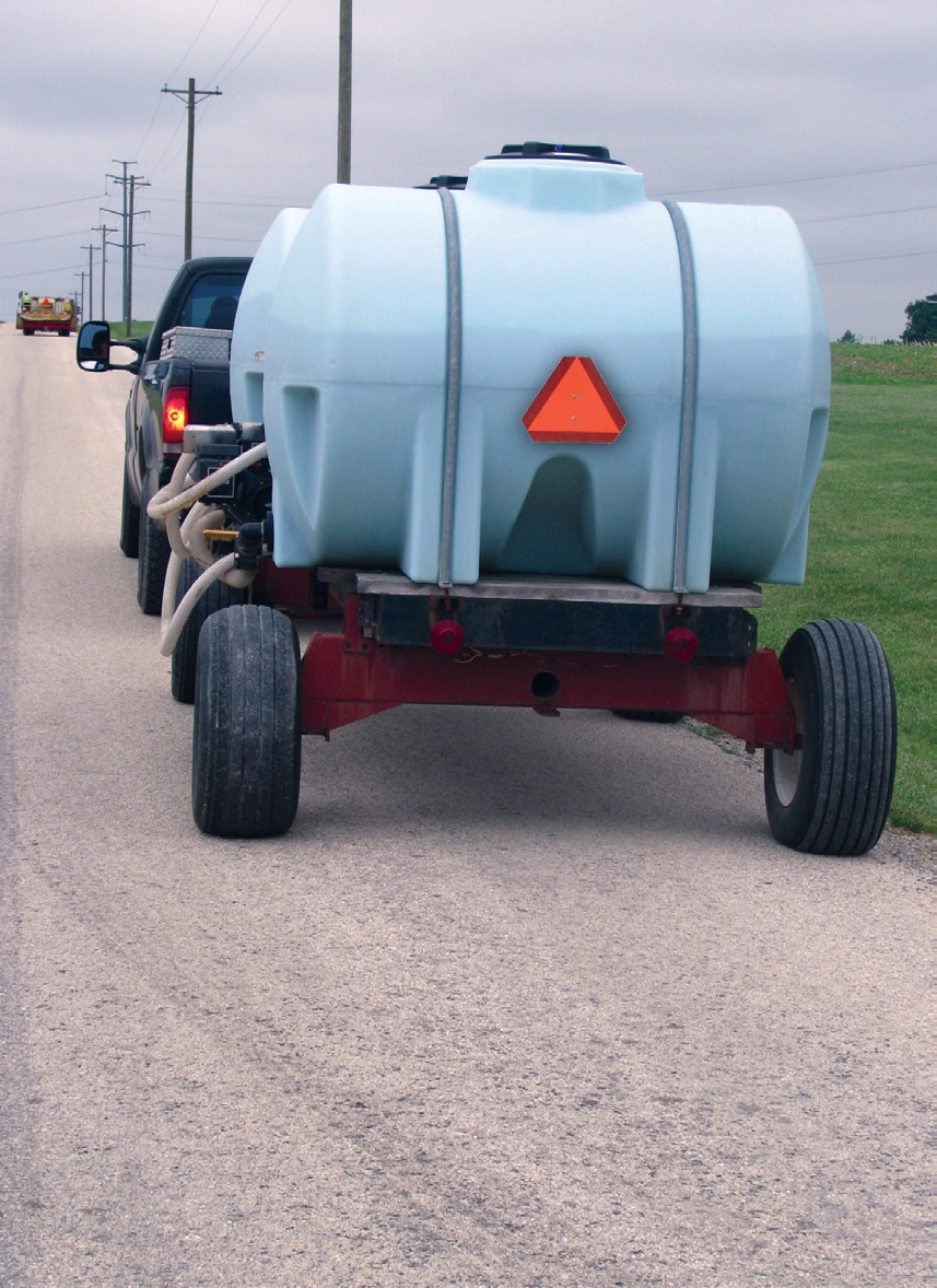 Truck with a tank trailer on the back