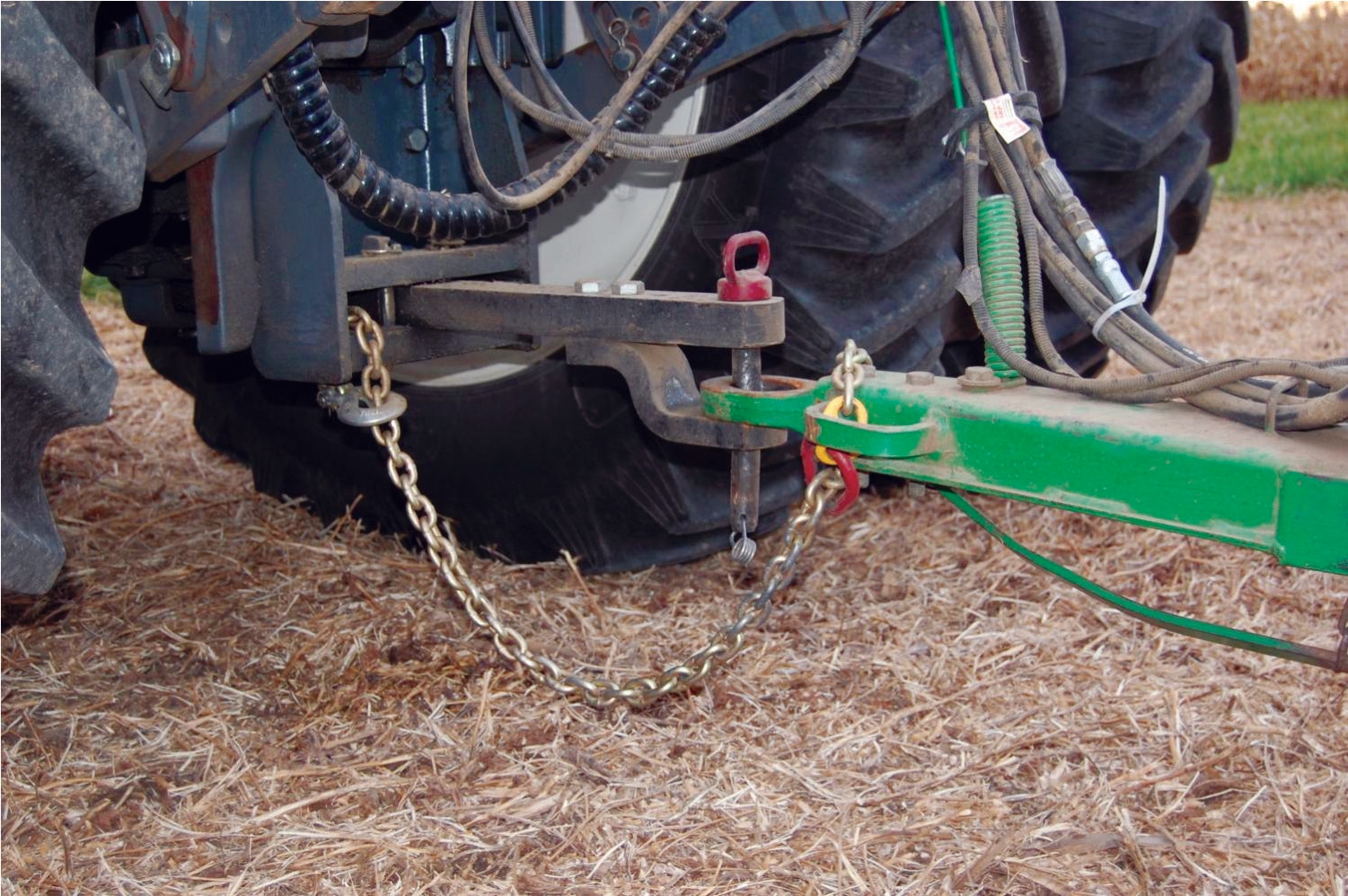 strong transport safety chain that will keep the tractor and trailer or implement connected long enough to allow the operator to pull over, if the hitch pin breaks