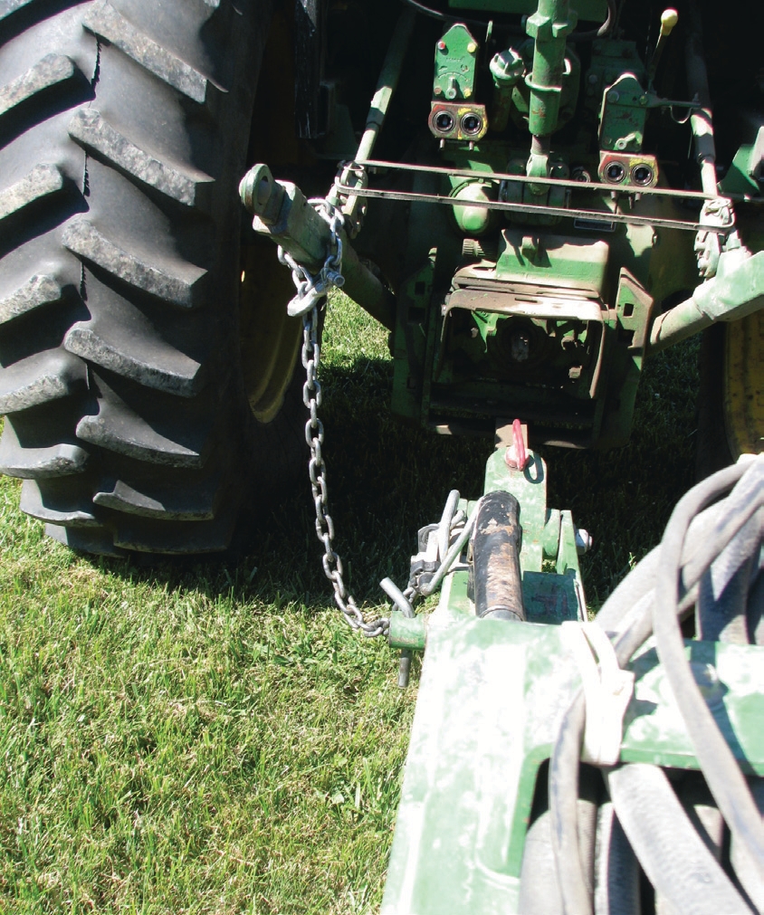 chain hooked to the tractor