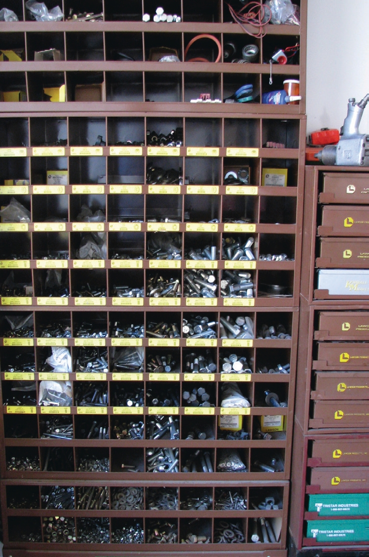 color-coded trays to organize his bolts and nuts