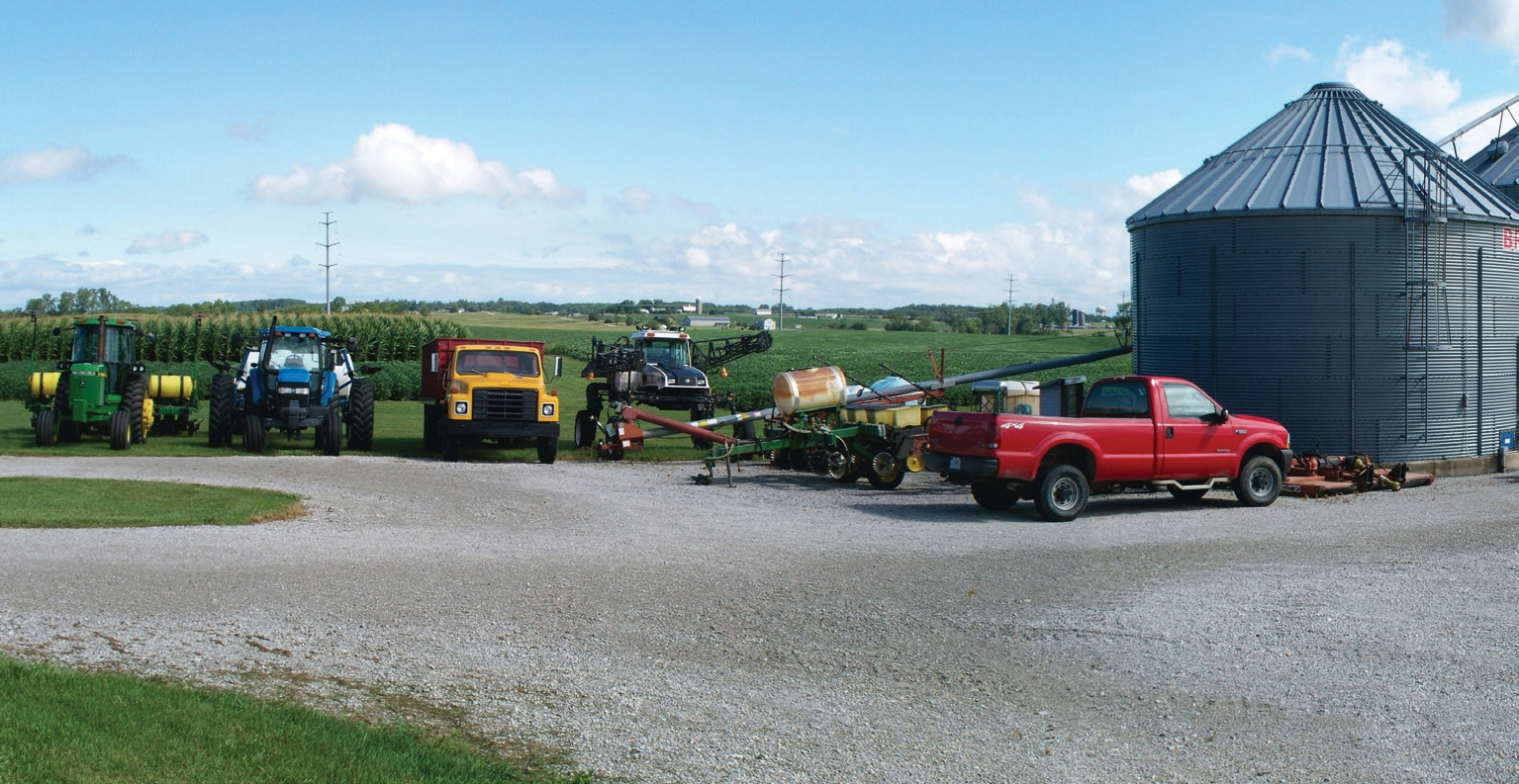 A farm with mutiple trucks