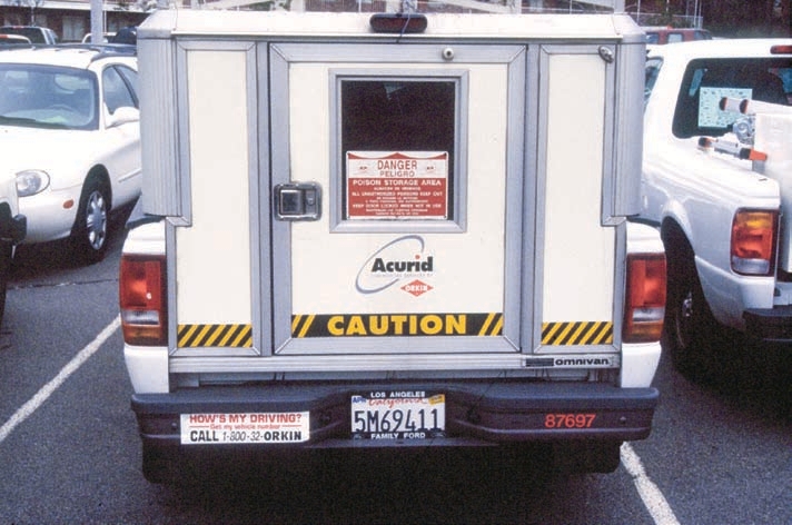 Howʼs my driving? sticker on the truck