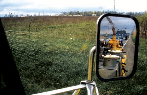 Traffic visible in the rear view side mirror