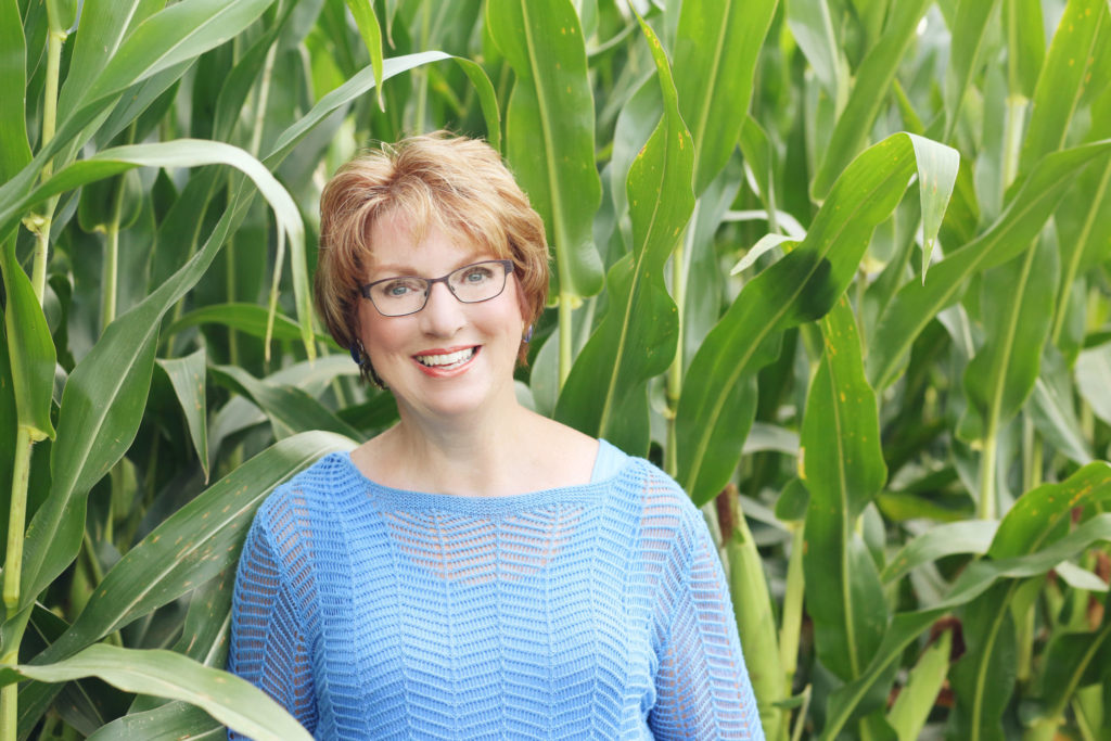 Jolene Brown standing in a corn field