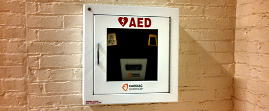 AED box on wall.