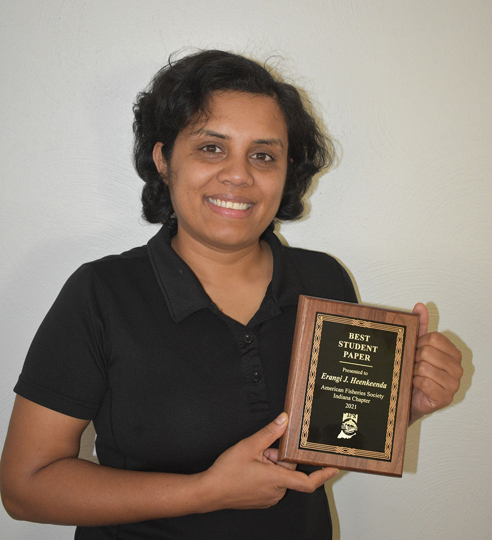 Erangi Heenkenda with her best student presentation award