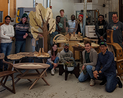 Furniture class group with their finished projects, Wood Research Lab