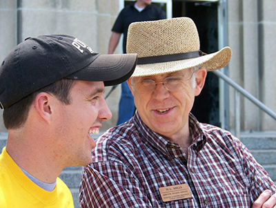 Seth Harden laughs with one of his FNR mentors W.L. Mills in 2012