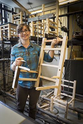 Dr. Eva Haviarova with broken chair