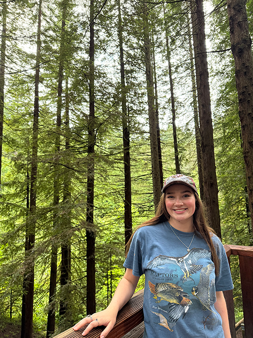 Paige Lawrence in a forest
