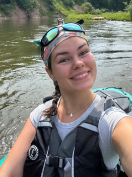 Maria Cesco takes a selfie while kayaking.