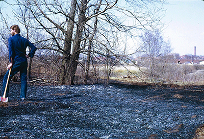 Glenn Juday after a prescribed burn on the Purdue Prairie in 1971