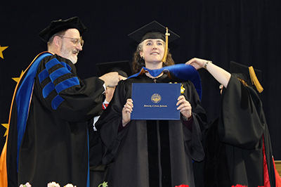 Glenn Juday hooding PhD student Kimberly Mahr