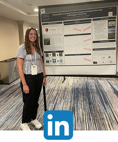 Student standing by poster, LinkedIn icon.