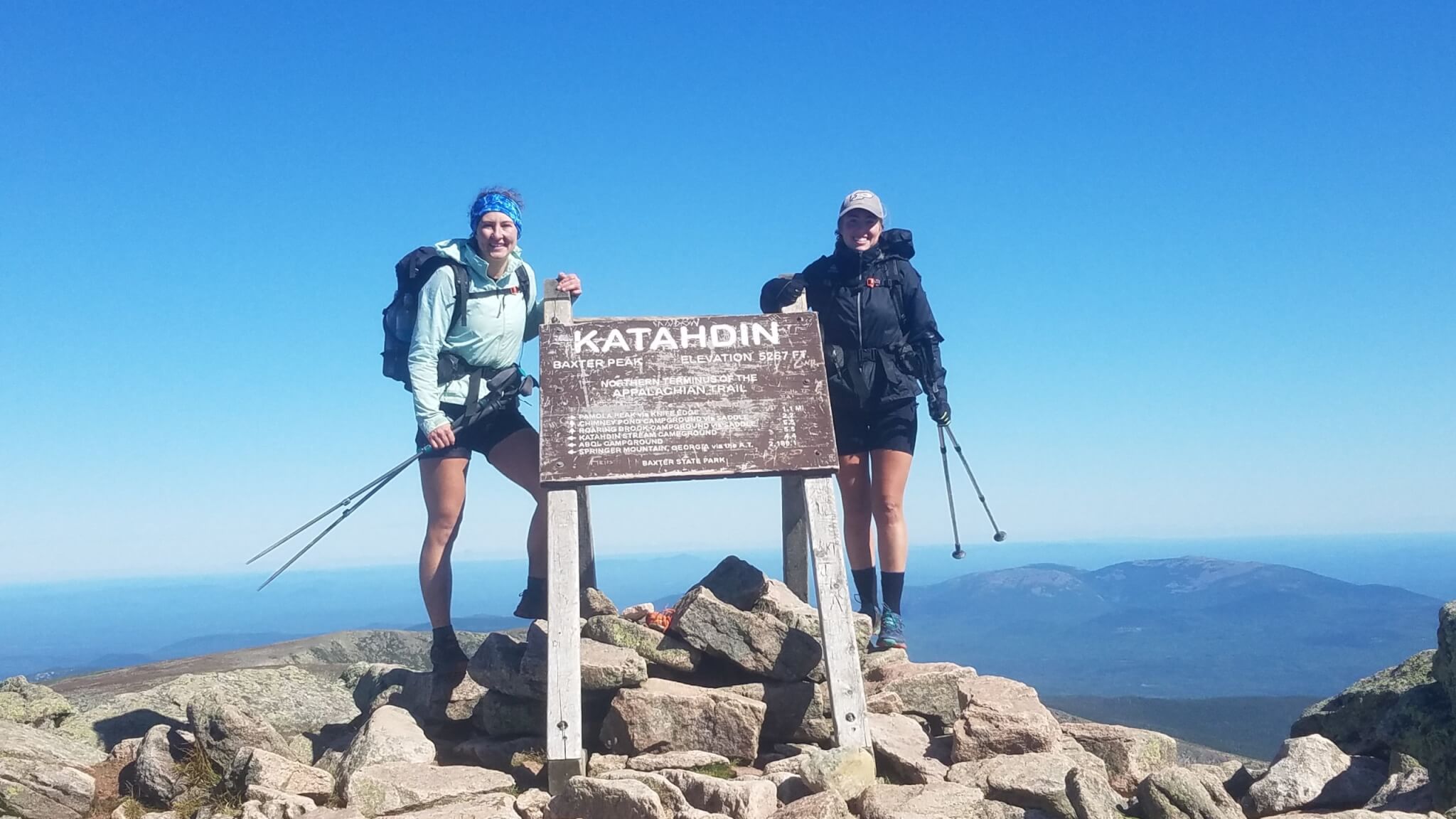 Rebekah Lumkes and Baleigh Haynes reach the top of the Appalachian Trail.