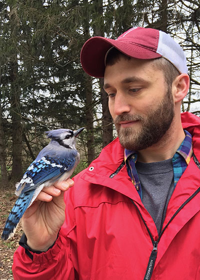 Patrick Ruhl with a blue jay