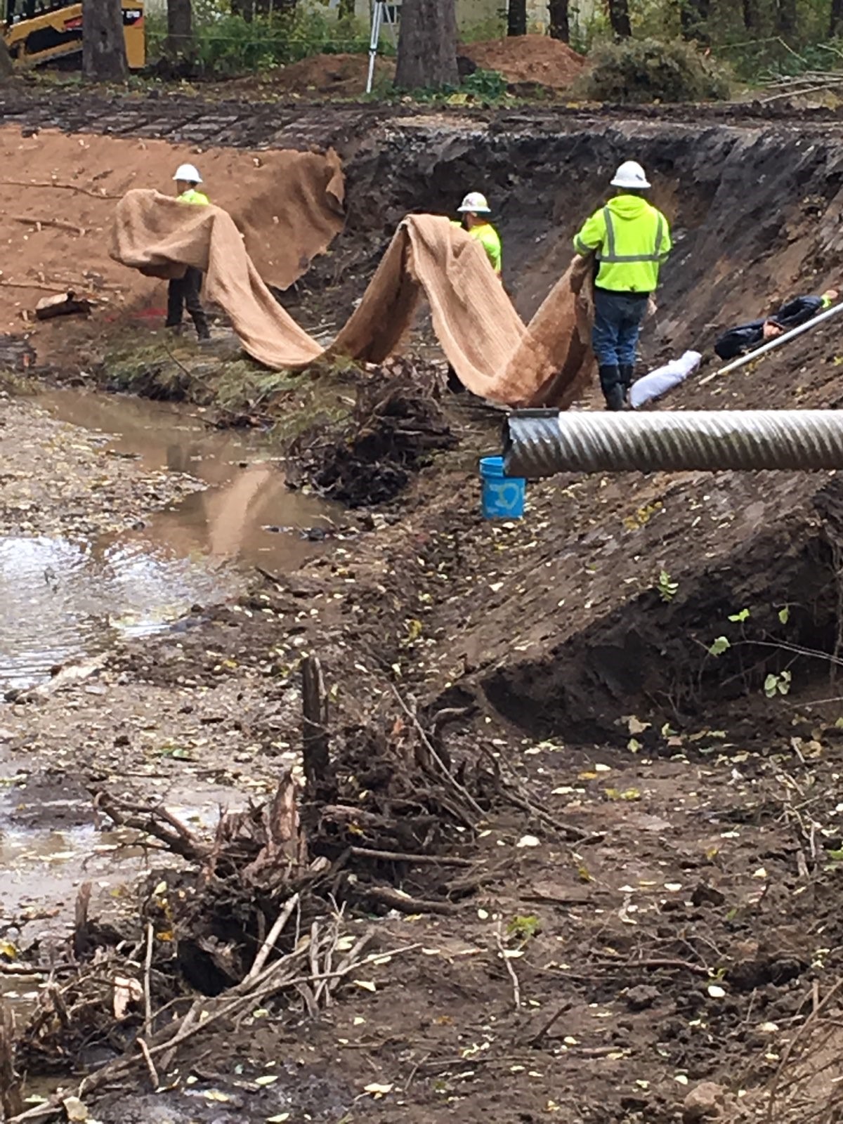 Martell Forest building retention wall for stream.