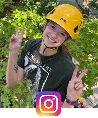Instagram image, student climbing tree.