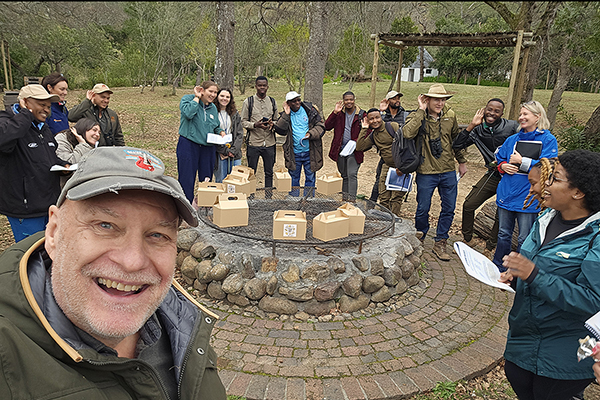 Dr. Bryan Pijanowski with research group in forest gathering data, Center for Global Soundscapes.