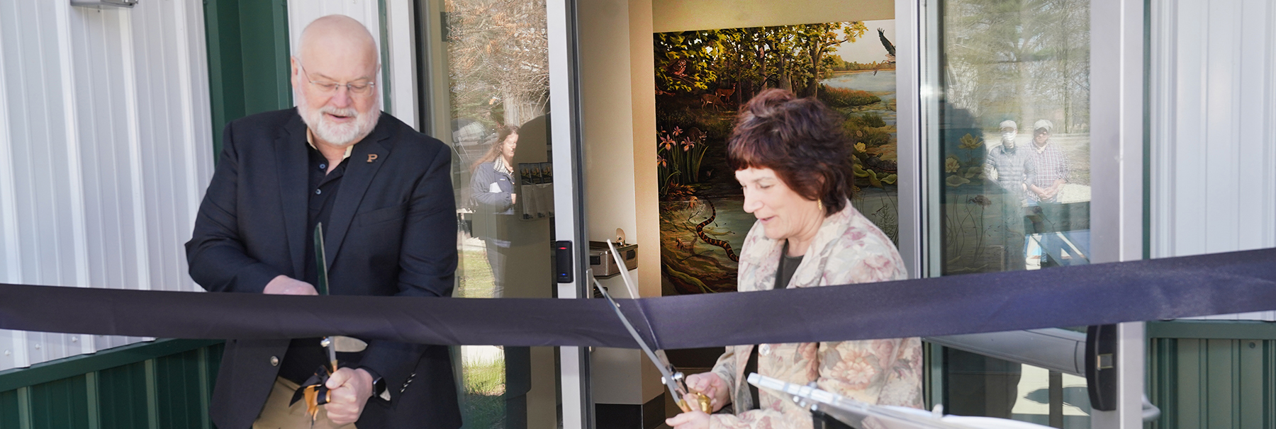 Dr. Bob Wagner and Dean Karen Plaut cut the ribbon to officially open the WERF Building