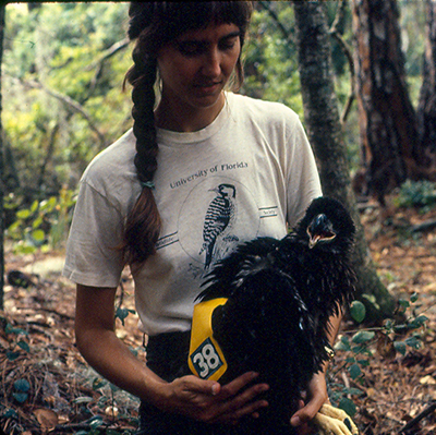 Petra Bohall Wood holds a bald eagle