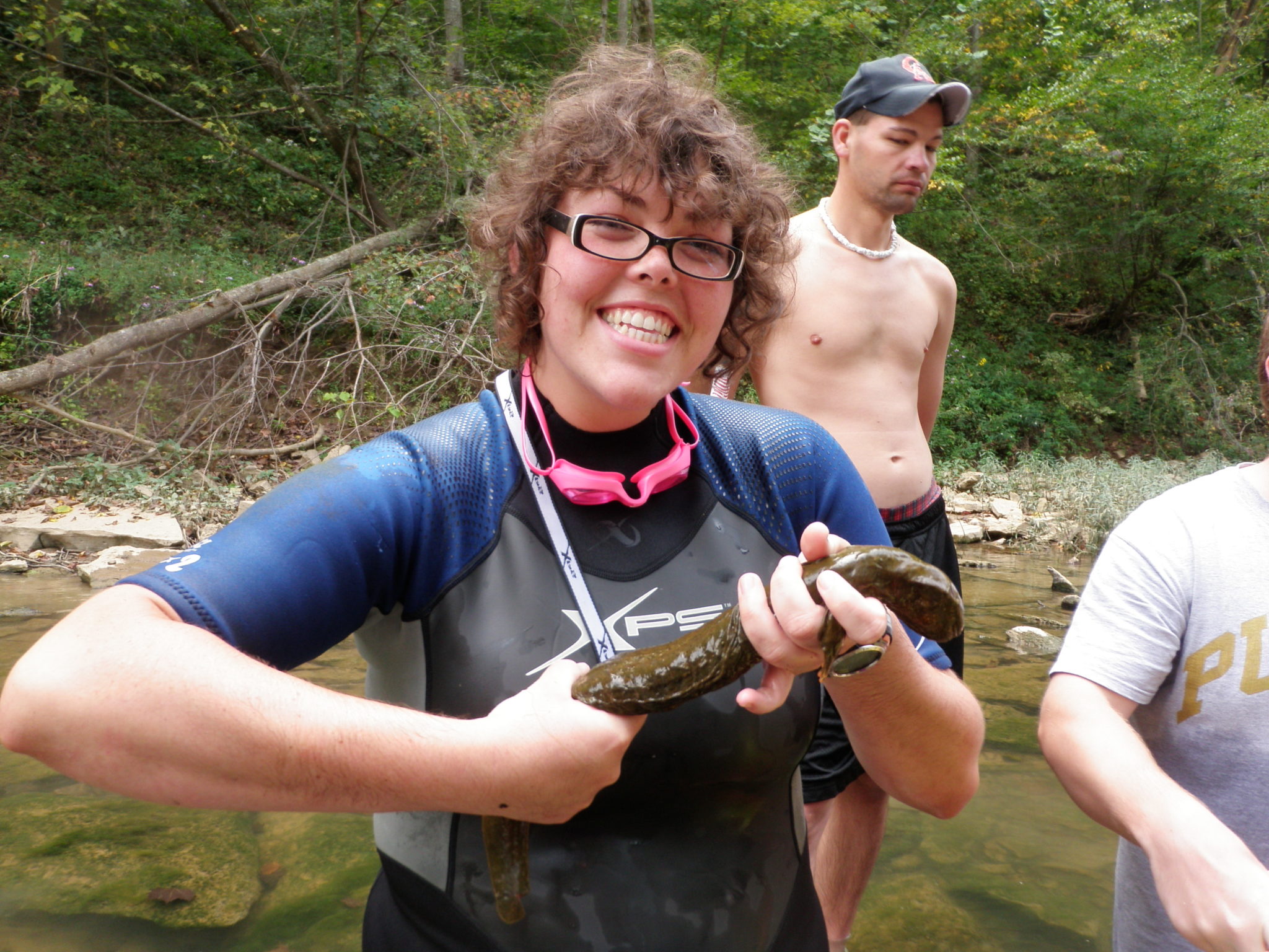 person holding a hellbender