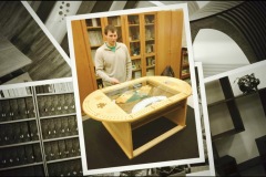 Game or puzzle storage table with glass top.