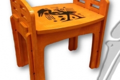 Wooden stool example with bird artwork top.