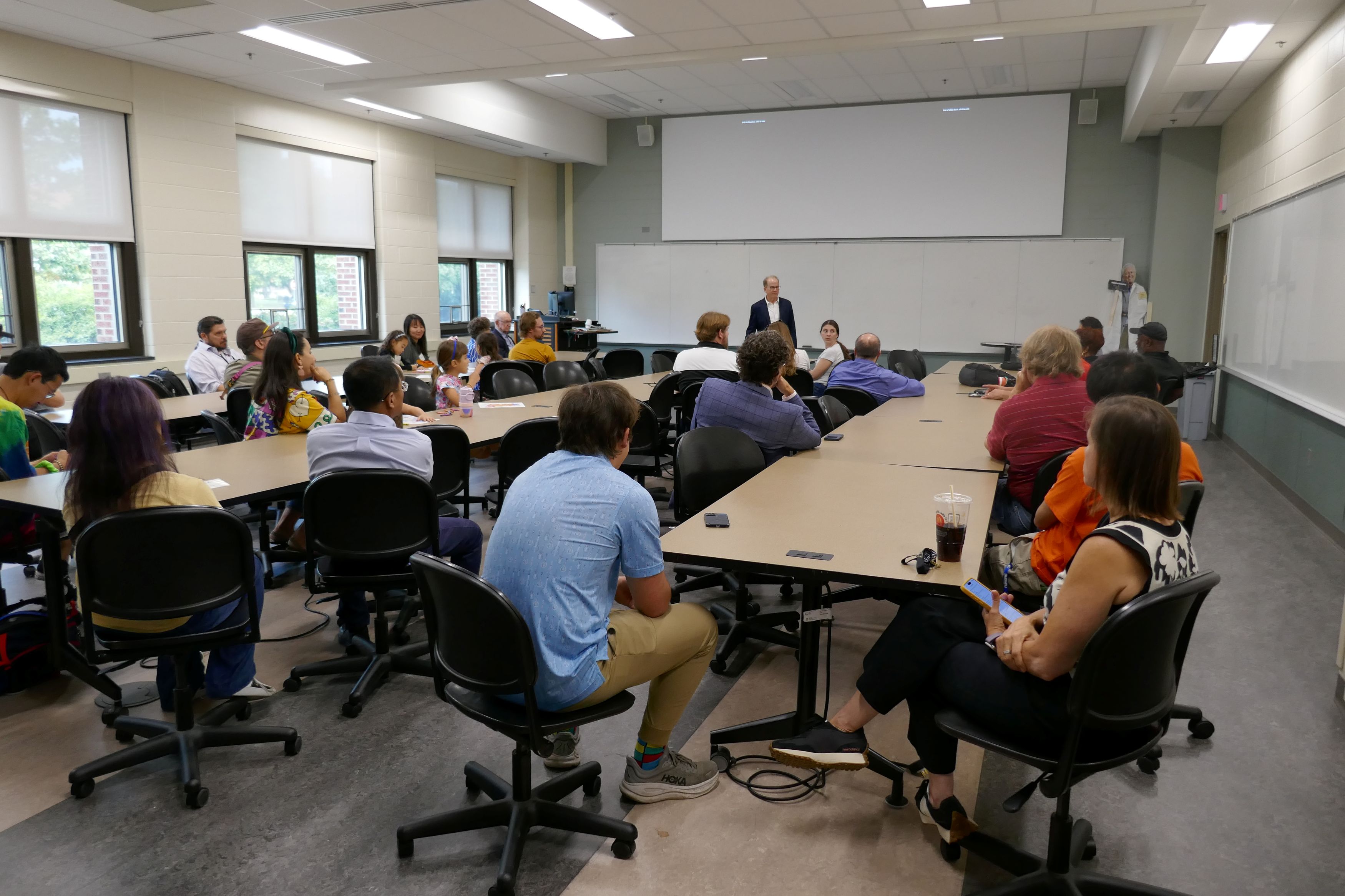 Group listening to a presentation in a classroom