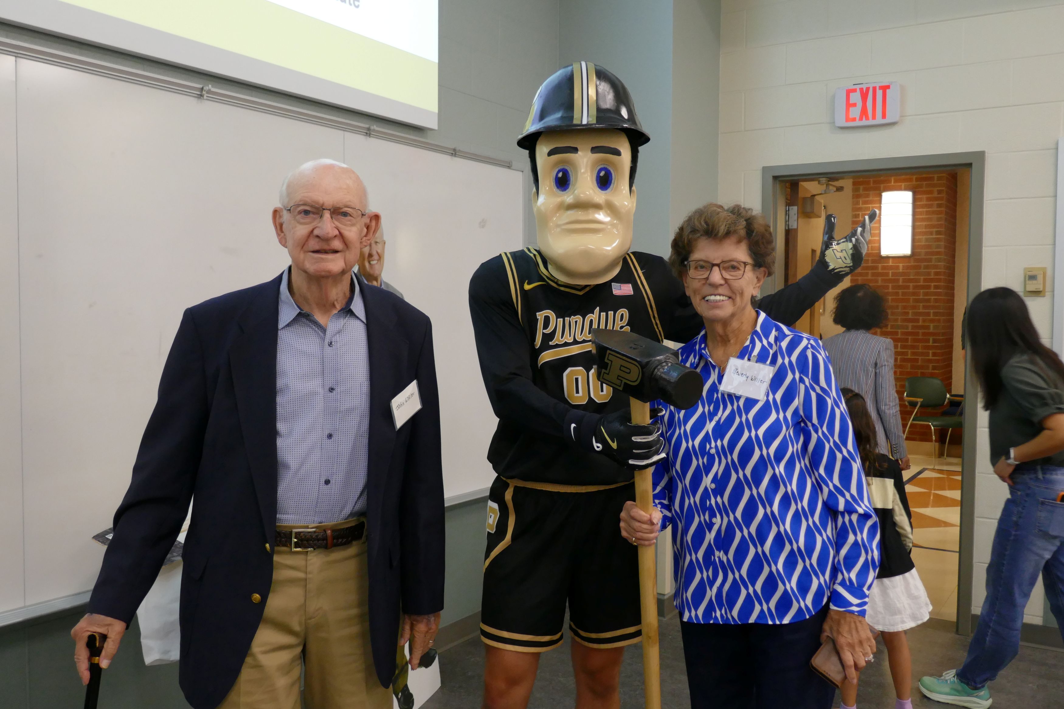 Couple poses with Purdue Pete