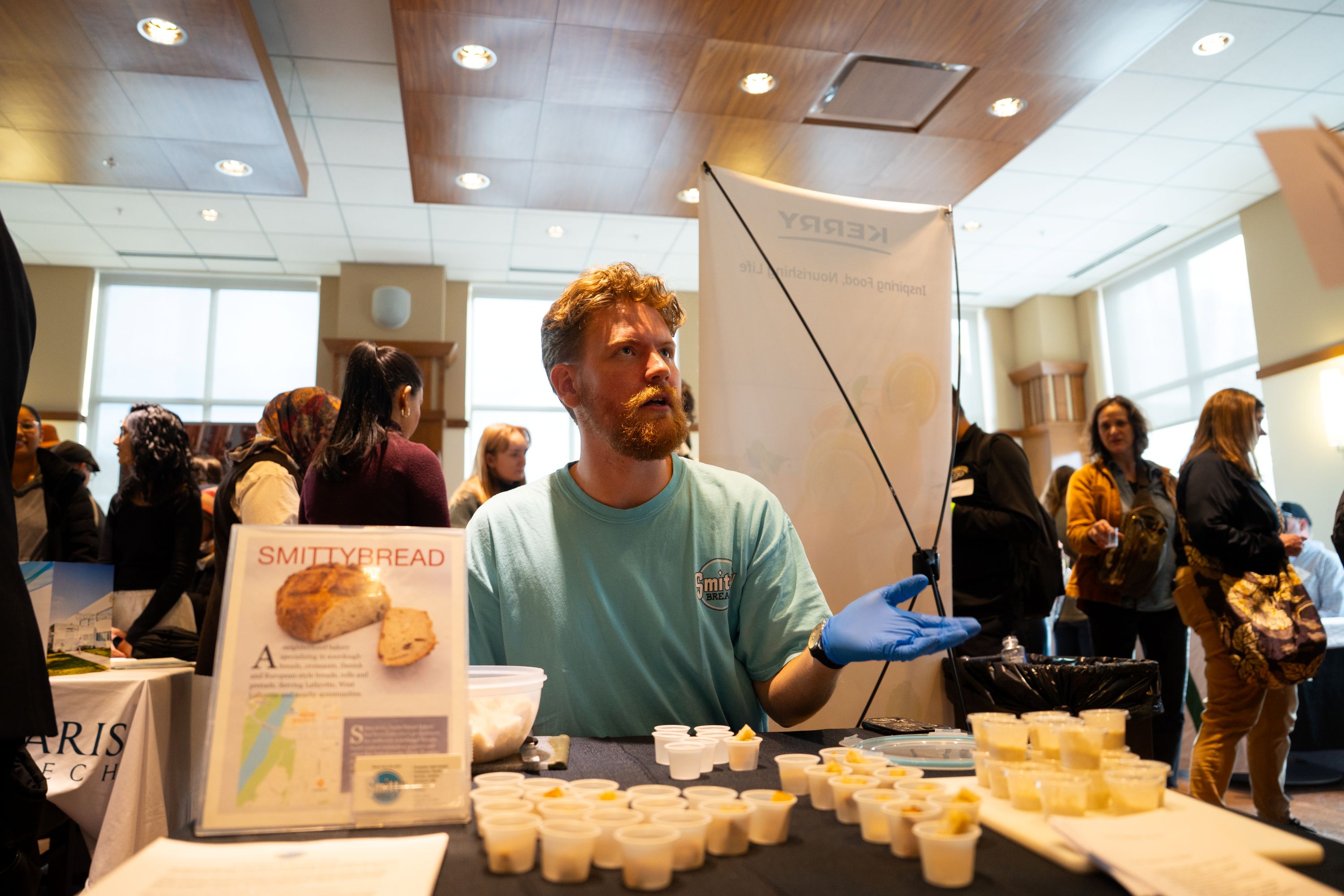 Man hands out bread samples