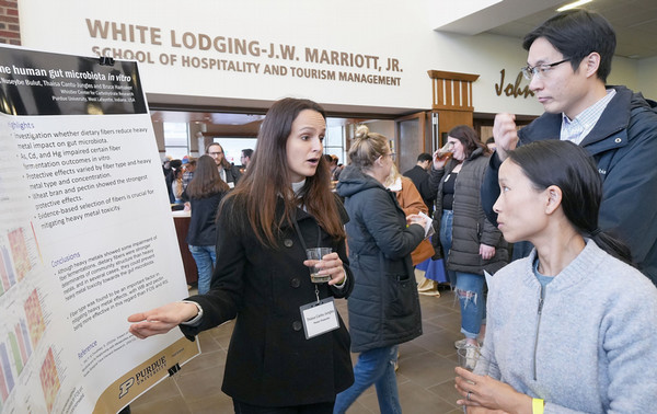 Faculty member presents research poster