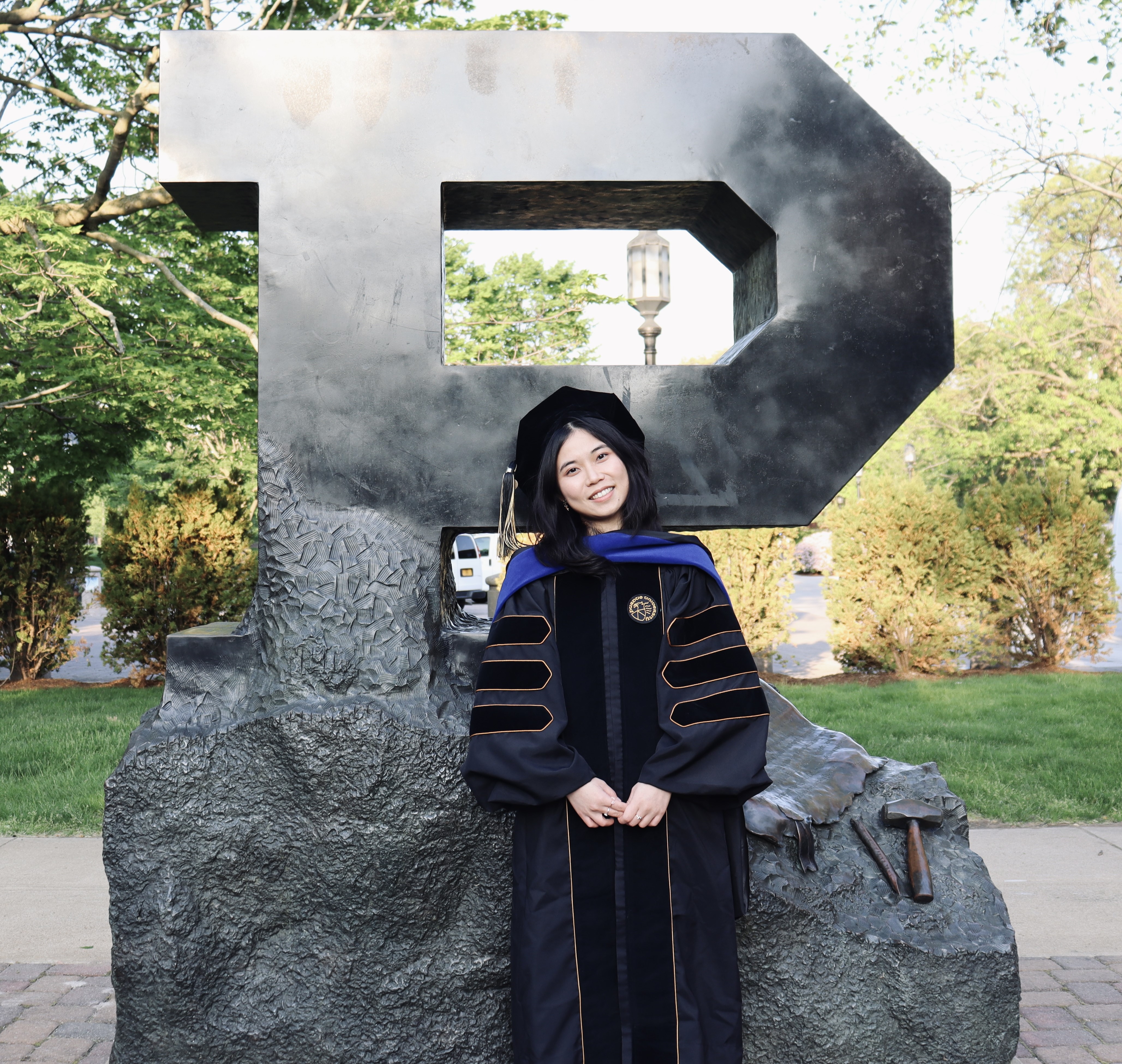 Han Chen in front of unfinished block P