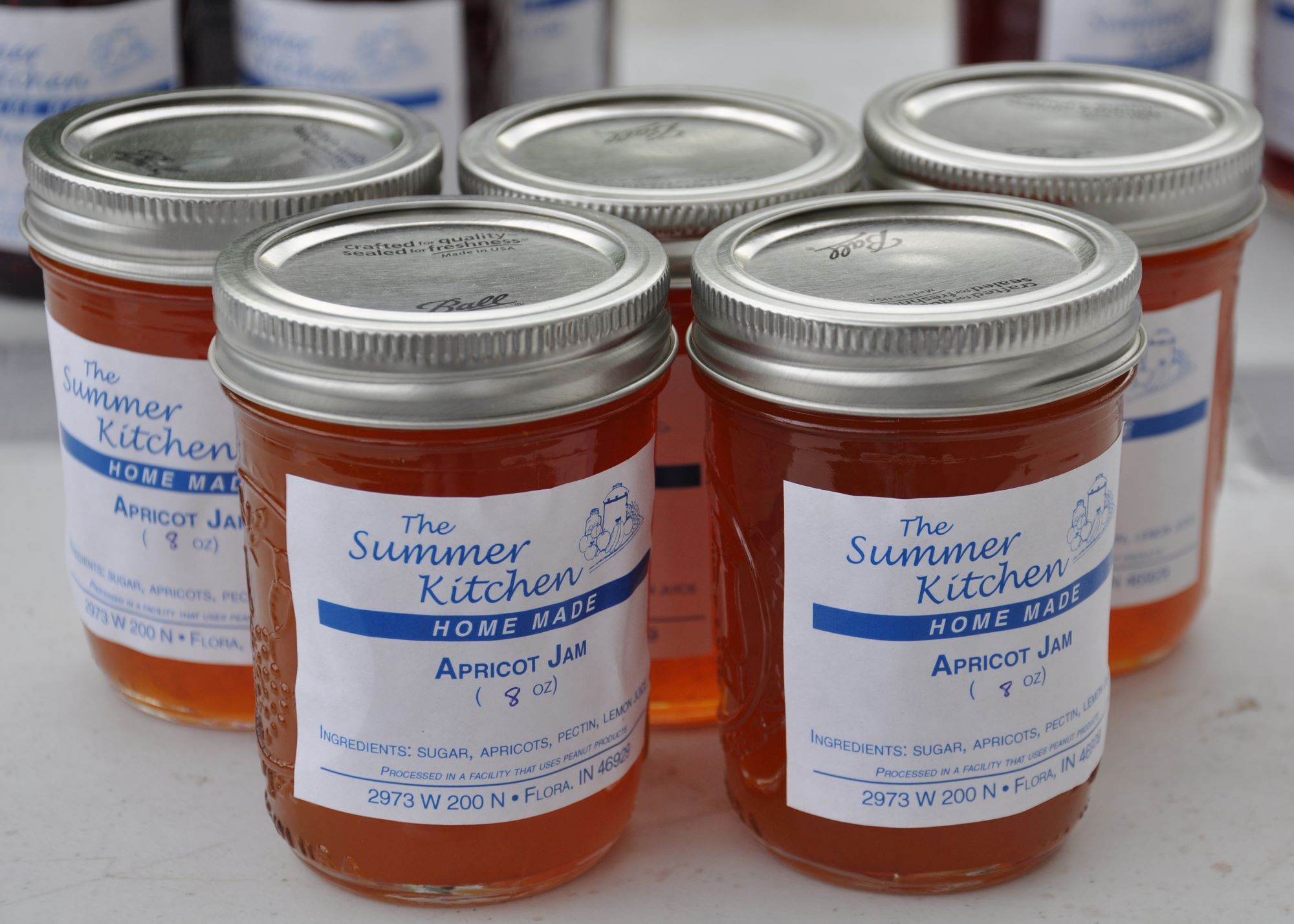 Cans of jam on a table