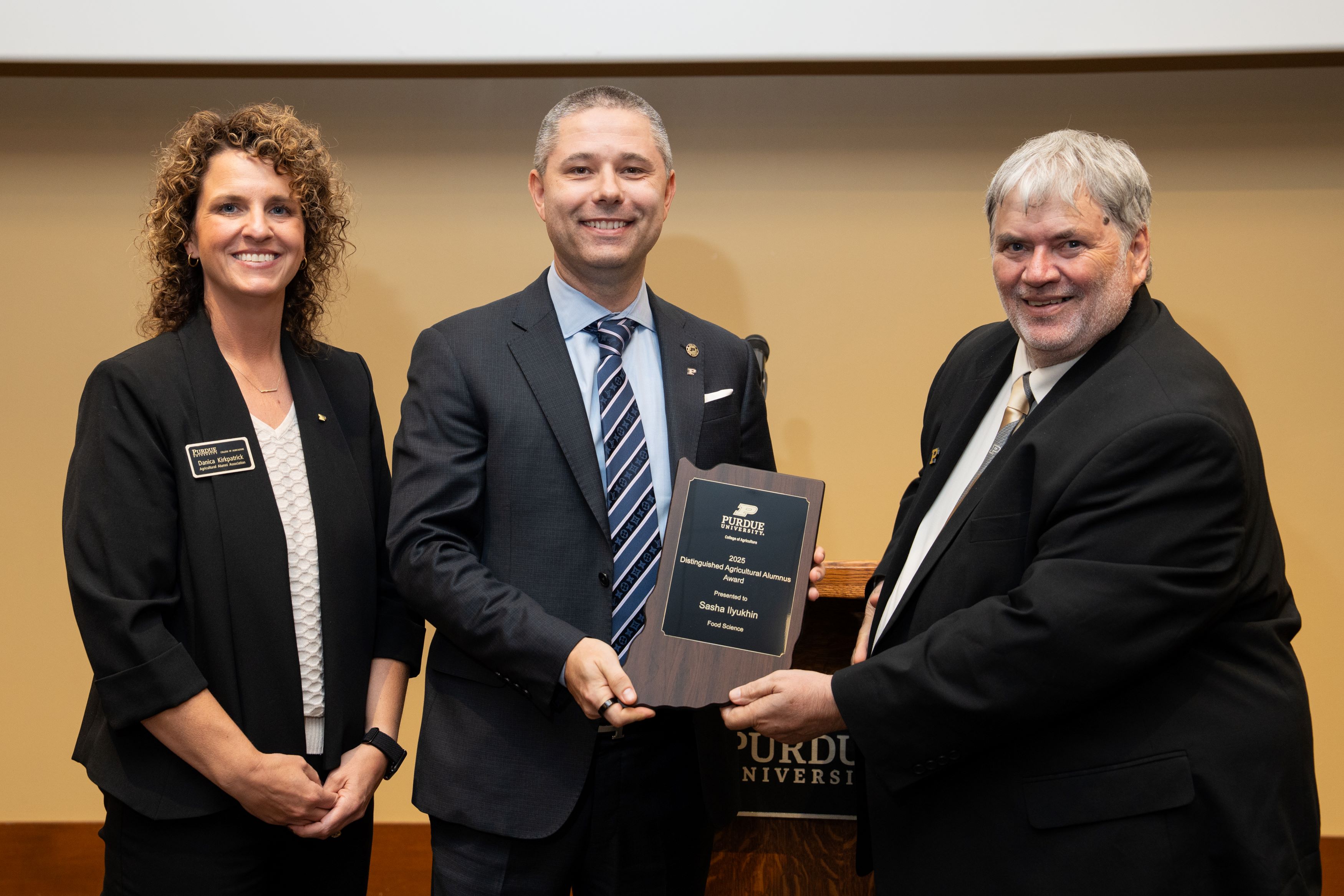 Sasha Ilyukhin with Dr. Bernie Engel and Danica Kirkpatrick 
