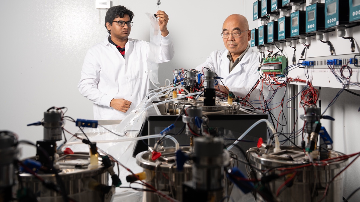 scientists working in lab on anaerobic digestion material