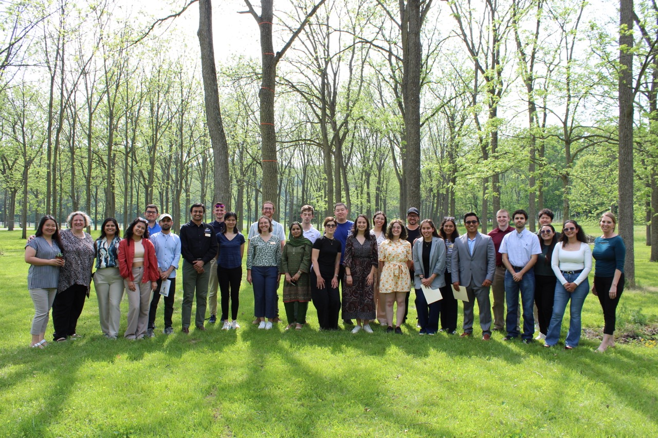 Group photo of grad students and visiting scholars