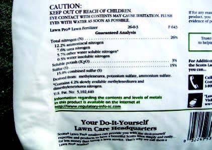 Close-up of fertilizer label showing guaranteed analysis and nutrient percentages