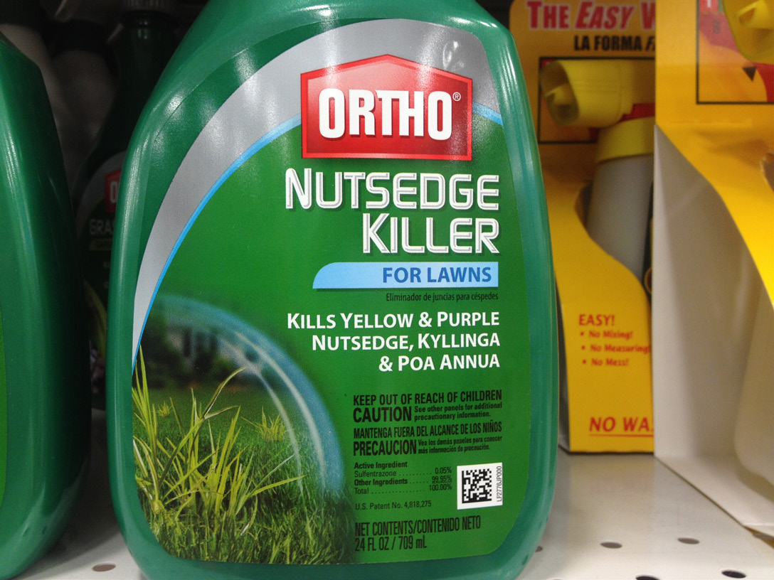 An image of a sedge herbicide branded "Ortho". 