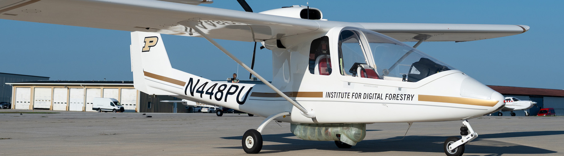Purdue's Institute for Digital Forestry two-seat sport aircraft on airport tarmac
