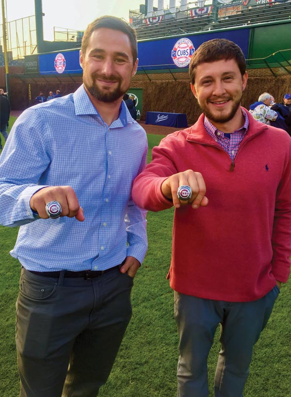 Dan Kiermaier and Ben Baumer display their 2016 Chicago Cubs World Series rings