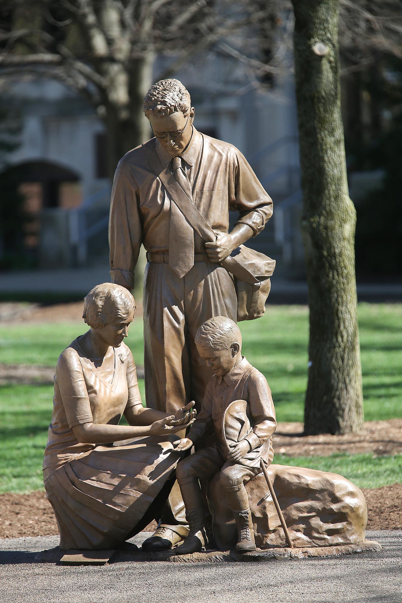 Photo of new statue outside of Ag administration depicting early entomologists