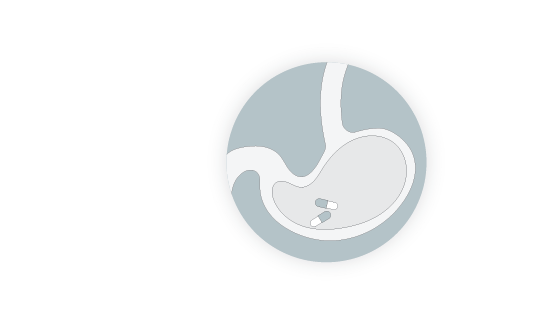Stomach with pill illustration