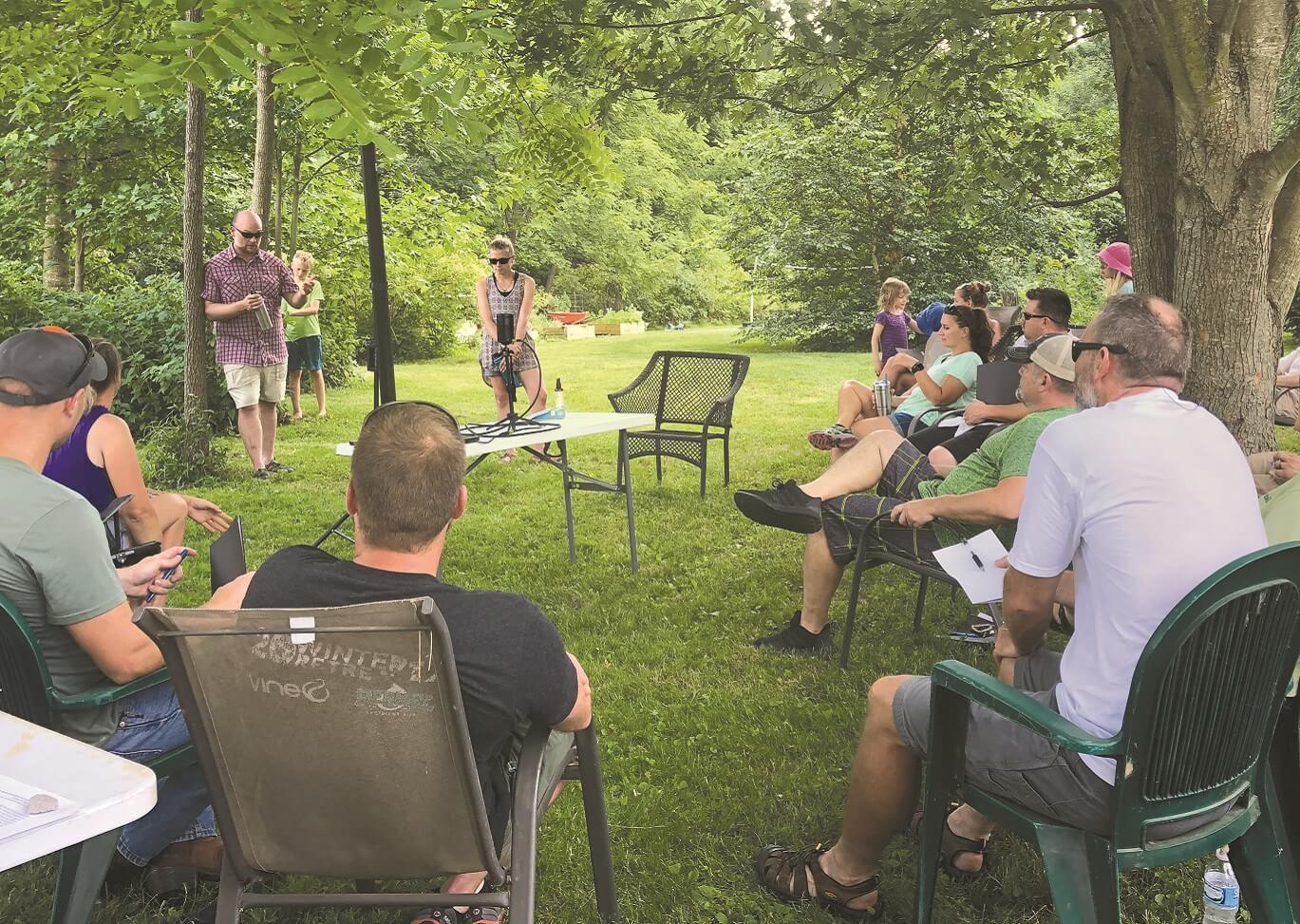 <i>Betty Feng and her lab members shared food safety knowledge
with veteran farmers at this Indiana farm tour.</i>