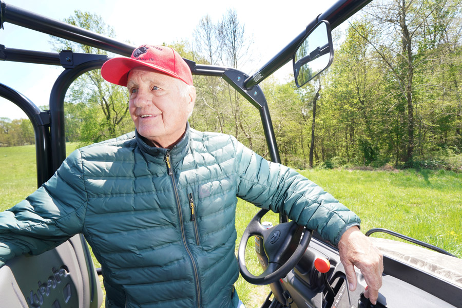 man driving tractor