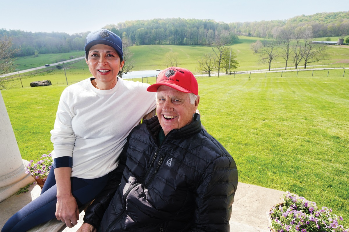 Fariba Zand and Hunter von Leer relax on the porch of their farm.